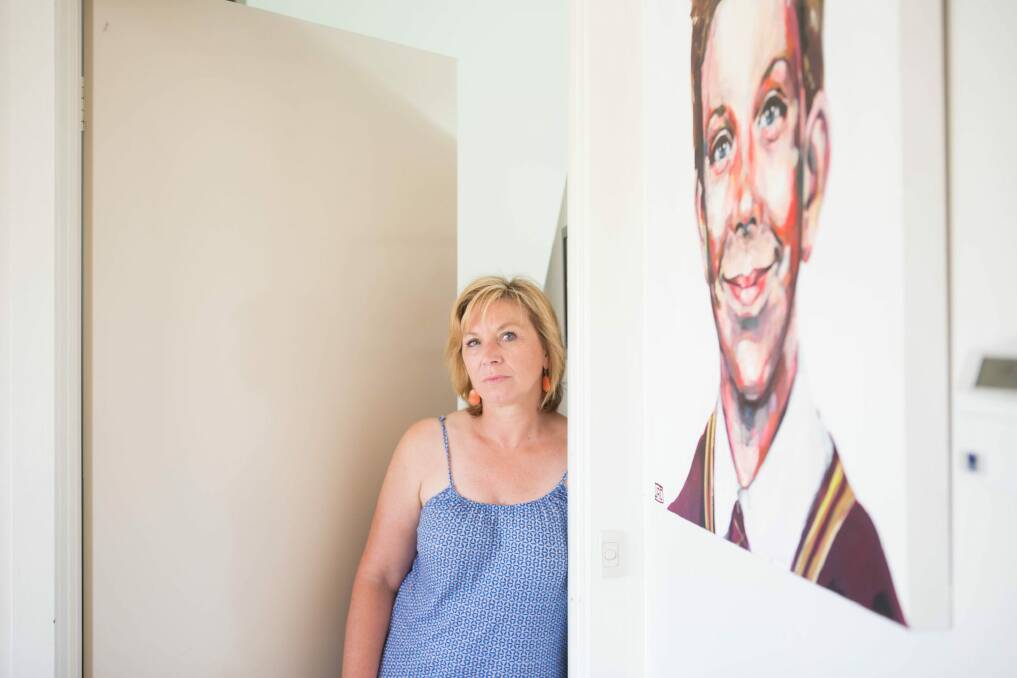 Rosie Batty earlier this month with a portrait of her beloved 11-year-old son Luke. She says his father, who killed him, loved him as much.  Photo: Simon Schluter