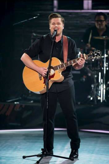 Canberra's Alex Gibson performing on the first live finals of The Voice this week.