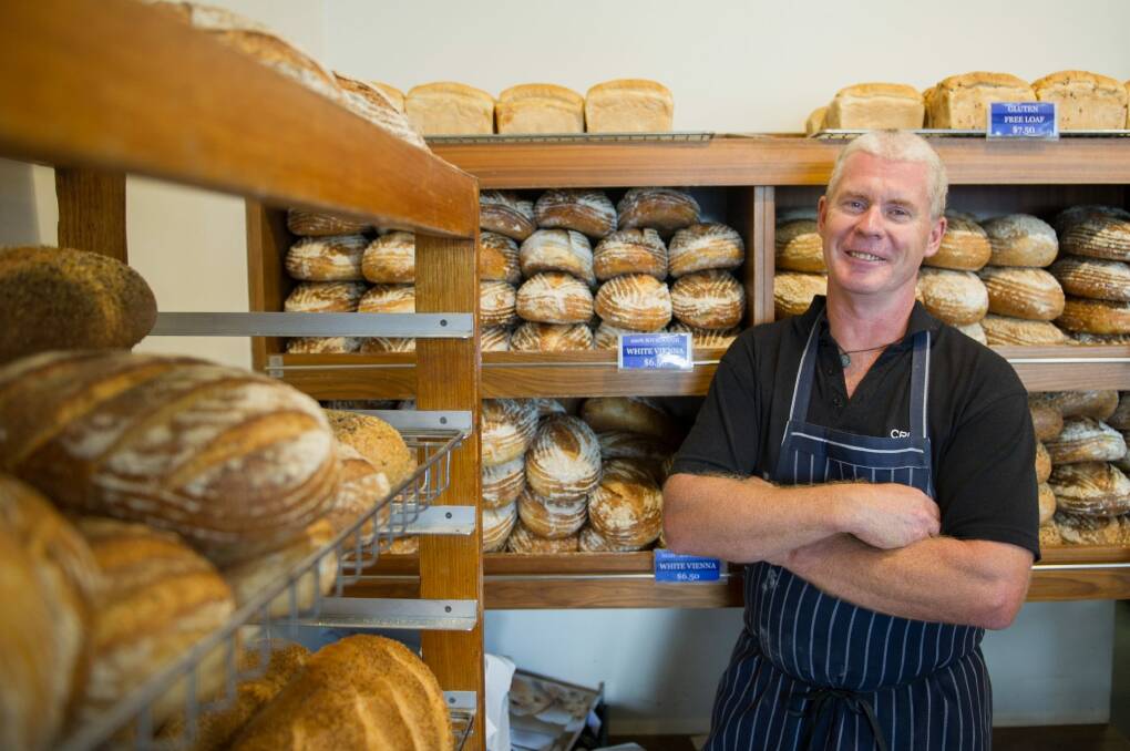 Crust baker Nick Smith at the Fyshwick Markets. Sutton residents say his new bakery cannot come soon enough.  Photo: Jay Cronan