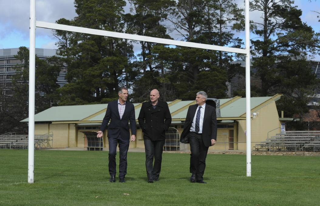 Raiders chief executive Don Furner, PCYC chief executive Stephen Imrie and Raiders general manager Mark Vergano at Northbourne Oval. Photo: Graham Tidy