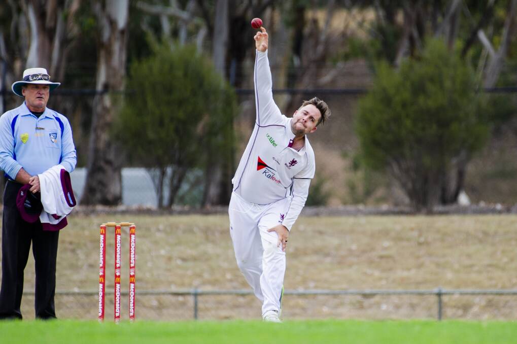 Wests-UC's Michael Minns rolls the arm over. Photo: Jamila Toderas
