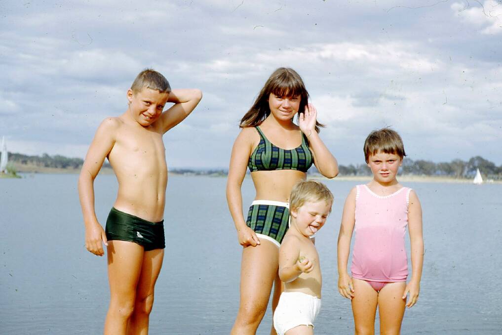 Swimming in Lake Burley Griffin used to be a much more common site. Lee Wilde and her three siblings, David, Jane and Kim swimming in Yarramundi Reach in 1966. Photo: Supplied