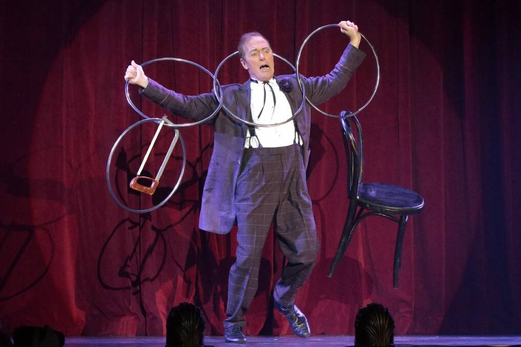 The Eccentric aka Charlie Frye performs with the linking rings as part of The Illusionists: 1903.  Photo: Jeffrey Chan