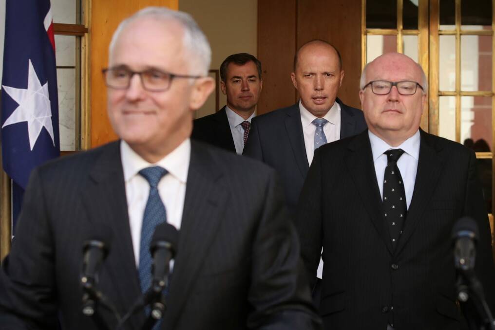 Prime Minister Malcolm Turnbull, Immigration Minister Peter Dutton and Attorney-General George Brandis. Photo: Andrew Meares