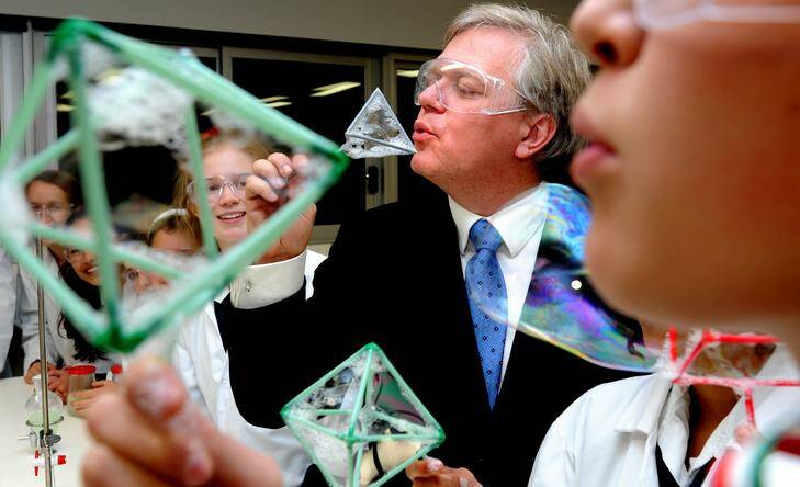 Noble prize winner Professor Brian Schmidt opens $13.5m science wing at Canberra Girls Grammar school, Deakin. Students Ellie Clear, Amelia Healy and on far right blowing bubbles is Rose Anderson. Photo: Melissa Adams