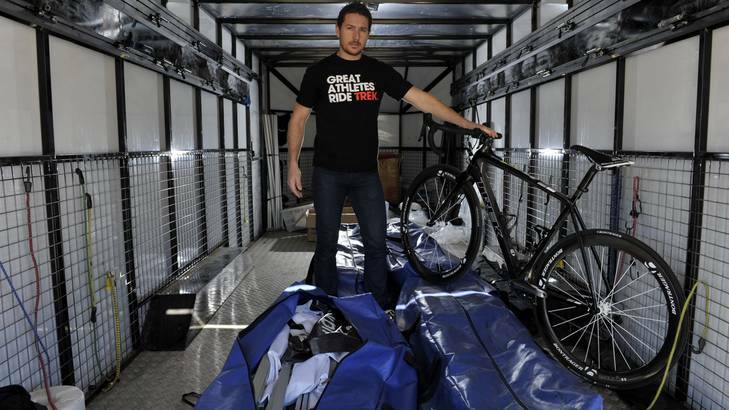 Simon Thompson  of Trek in the trailer after more than $183,000 worth of bikes were stolen from inside it over the weekend.