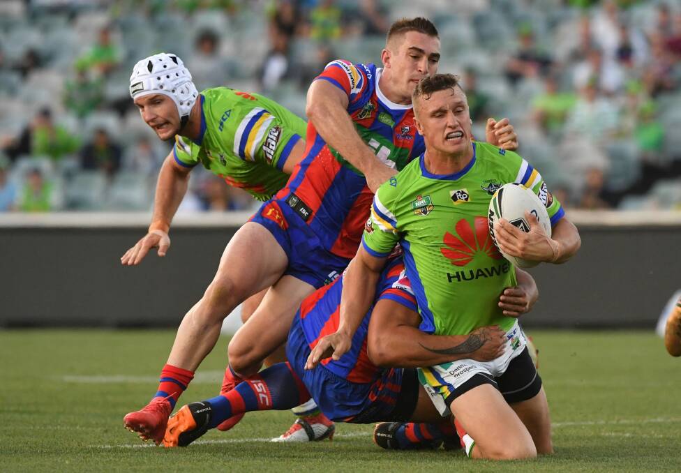 Jack Wighton is reined in by the Knights' defence.