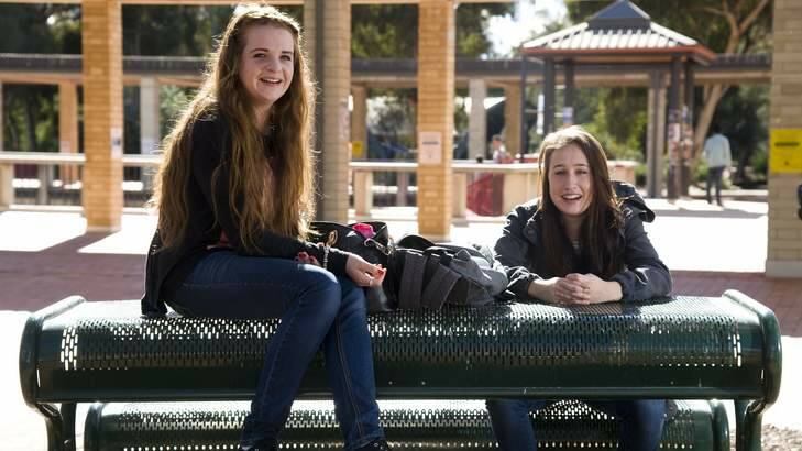 CHANGE ''INEVITABLE'': University of Canberra students Erin Davis, 19, and Nicole Semmler, 20. Ms Davis says the higher fees will turn people away from tertiary education. Photo: Elesa Kurtz