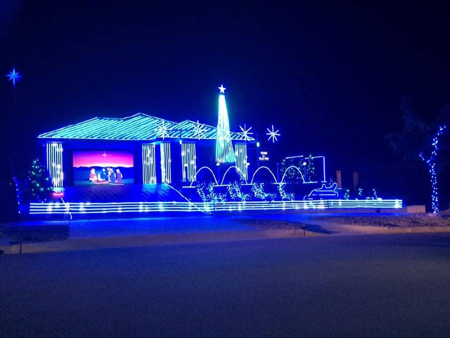Elia Ware Crescent in Bonner is all lit up for Christmas to raise money for Legacy. Photo: James Petterson