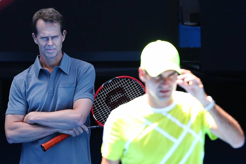 Coach Stefan Edberg watches on as Roger Federer practises. Photo: Michael Dodge/Getty Images