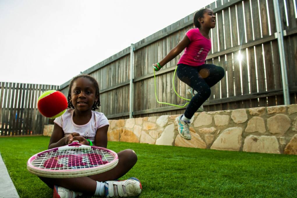 Sisters Ellyza and Shadelle  Agyemang-Duah keep active and eat healthy, but their mother worries about the temptations of junk food as they grow older. Photo: Elesa Kurtz