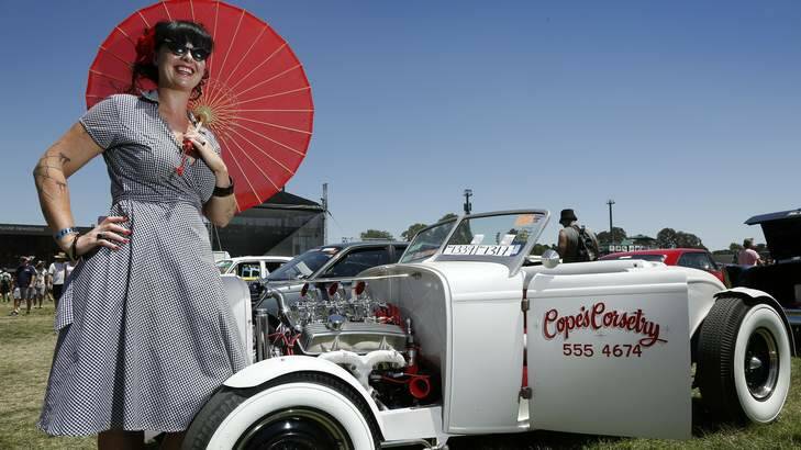 Sarah Cope from Engadine keeping cool with her 1932 Ford Roadster. Photo: Jeffrey Chan