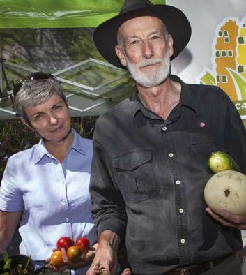 Virginia Proust and Keith Colls from the Canberra City Farm Society celebrating the Harvest Festival. Photo: Katherine Griffiths