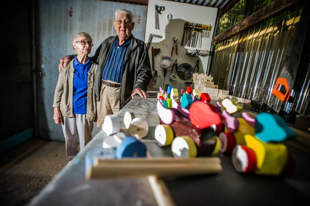 Kambah couple Beryl and John Fillery make sturdy wooden toys for children and give them away at Christmas time. Photo: Karleen Minney