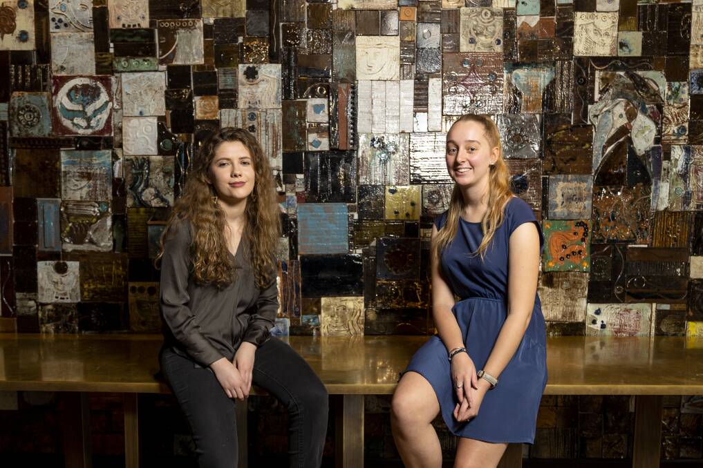 Interior design students Jillian Storrs (left) and Olivia Schmidt in one of their favourite sections of Monster. Photo: Lawrence Atkin
