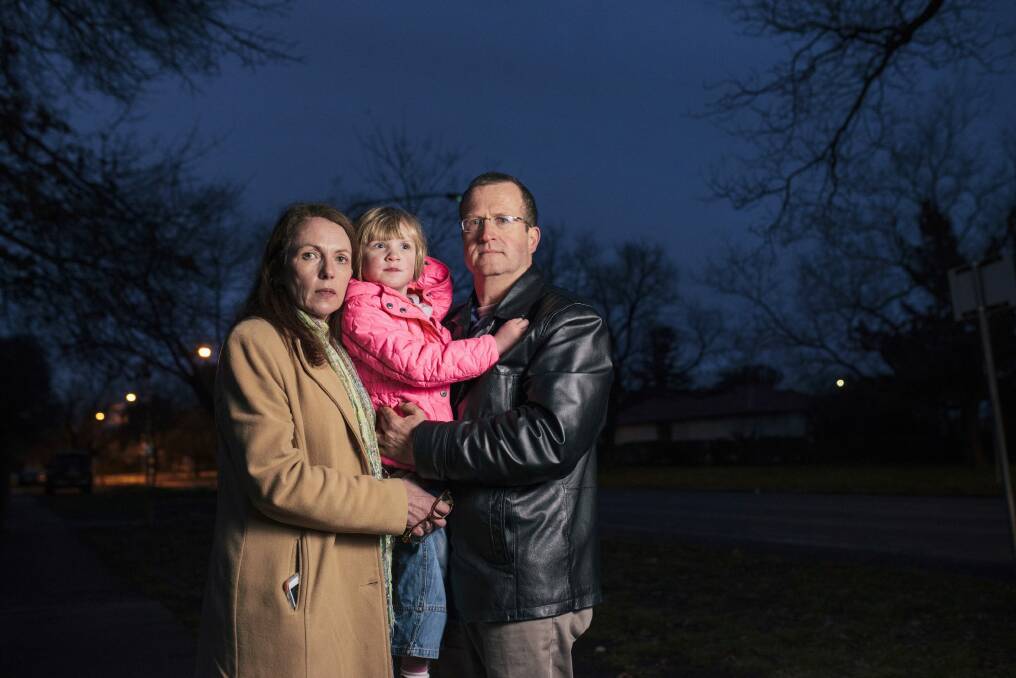 Donna and Mike Hettinger with their daughter Phoebe, four, who was attaked by a dog last year. 

 Photo: Rohan Thomson