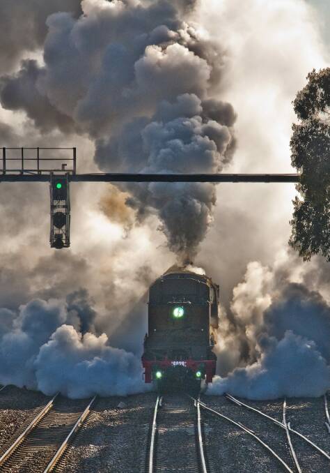 The 6029 Beyer-Garratt steam locomotive leaving Goulburn. Photo: Howard Moffat