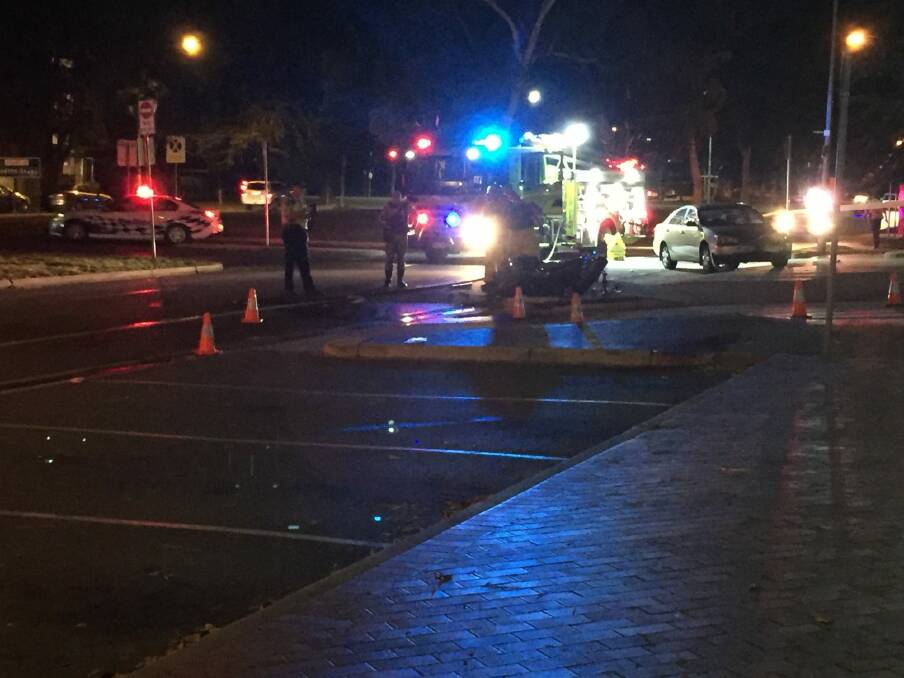 Police at the scene of the two-vehicle crash in Manuka on Friday night. Photo: Georgina Connery