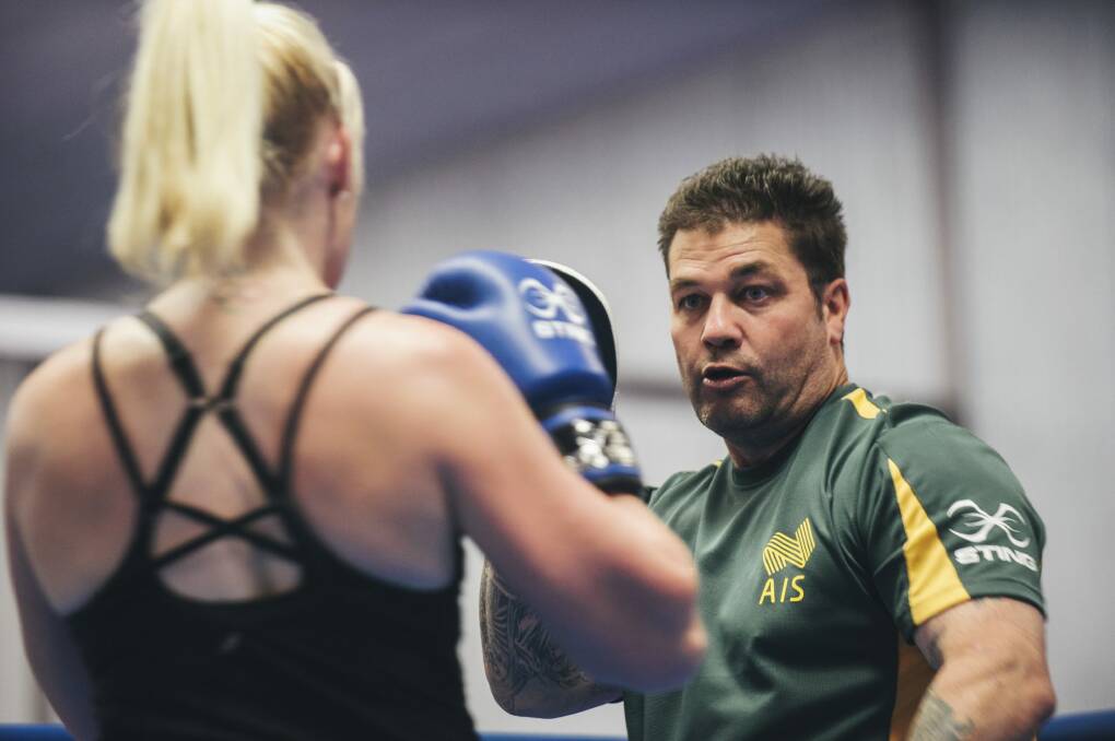 Mix 'n'match: Boxing Australia coach Paul Perkins has been working with Paralympic rower Kathryn Ross. Photo: Rohan Thomson