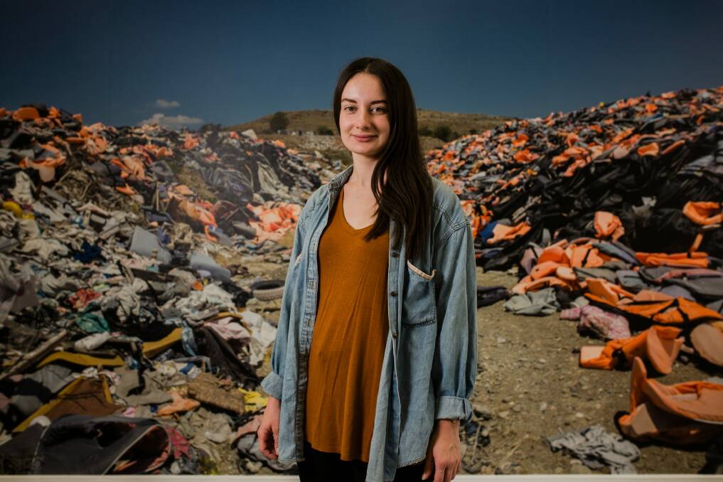 Graduating Exhibition of the ANU School of Art. Bachelor of International Relations/Visual Arts (Photomedia) Photography and Media Arts Graduate Ciara O'Brien with her work 'Life Jacket Graveyard', 2016. Photo Jamila Toderas Photo: Jamila Toderas