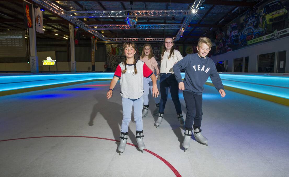 Madison Hooper, Chloe Carpenter, Jessica Element and Riley Element try Australia's first synthetic ice rink, iSkate Park. Photo: Elesa Kurtz