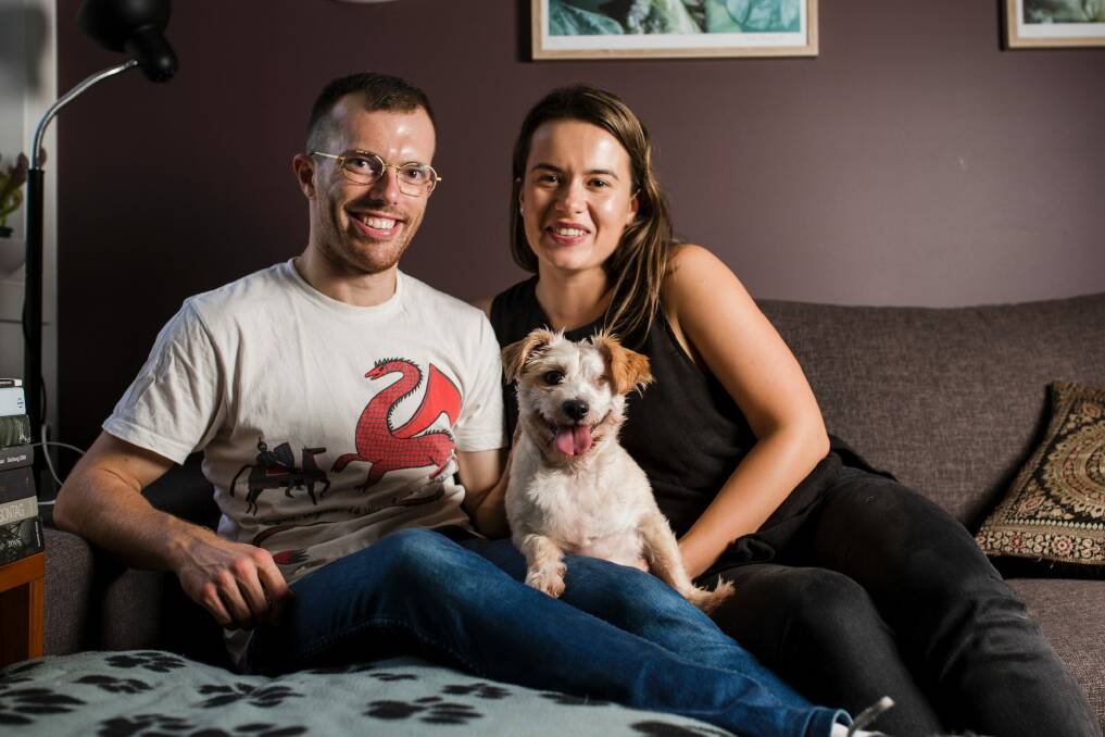Turner couple David Kearns and Alisa Draskovic are the proud new owners of Lochie, the dog recently rescued by RSPCA ACT. Photo: Jamila Toderas