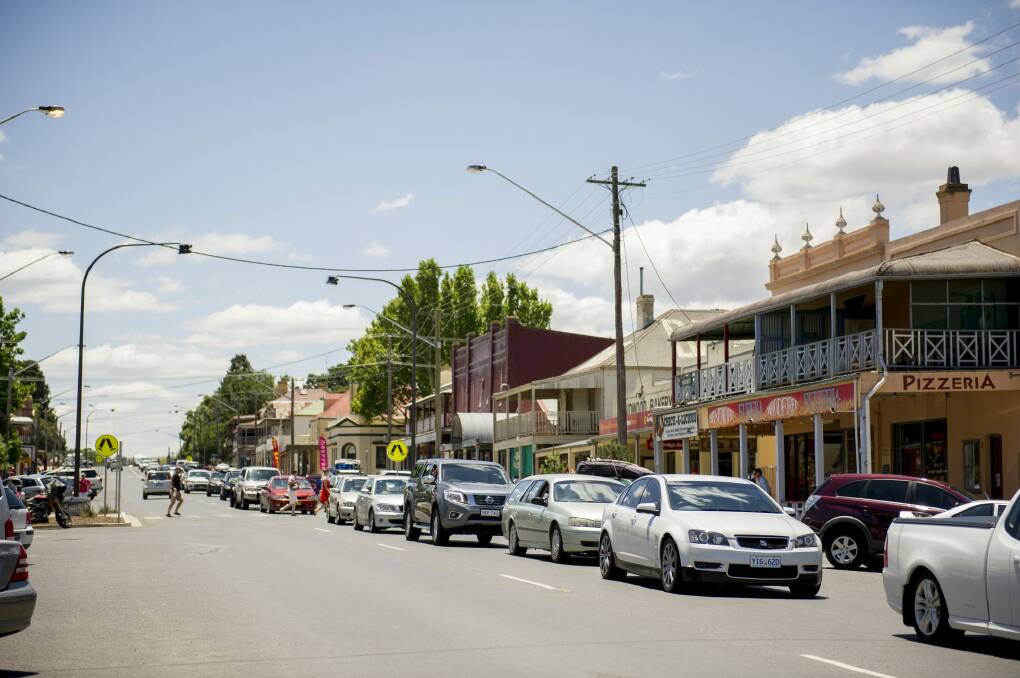 Traffic builds up in Braidwood on Sunday during the annual Canberra migration to the south coast.  Photo: Jay Cronan