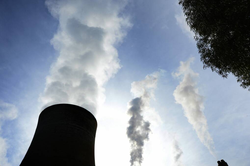 Steam billows from the cooling towers at TRUenergy Holdings Pty's Yallourn coal-fired power station in Yallourn, Australia.  Photo: Photo: Bloomberg