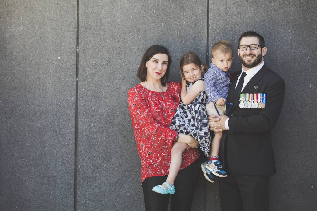 Renee and Gary Wilson, with daughter Abigayle and son Lachlan, at Sunday's Remembrance Day event.  Photo:  Jamila Toderas