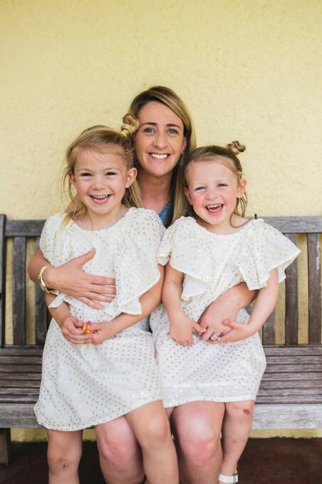 Canberra United coach Heather Garriock at home with her daughters, Noa, 3, and Kaizen, 5, plans to enjoy the Canberra lifestyle in 2018. Photo: Rohan Thomson