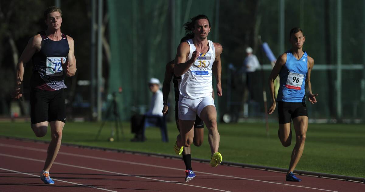 Joshua Clarke (centre) speeds into the Olympic team with a 10.15-second effort at the AIS. Photo: Graham Tidy 
