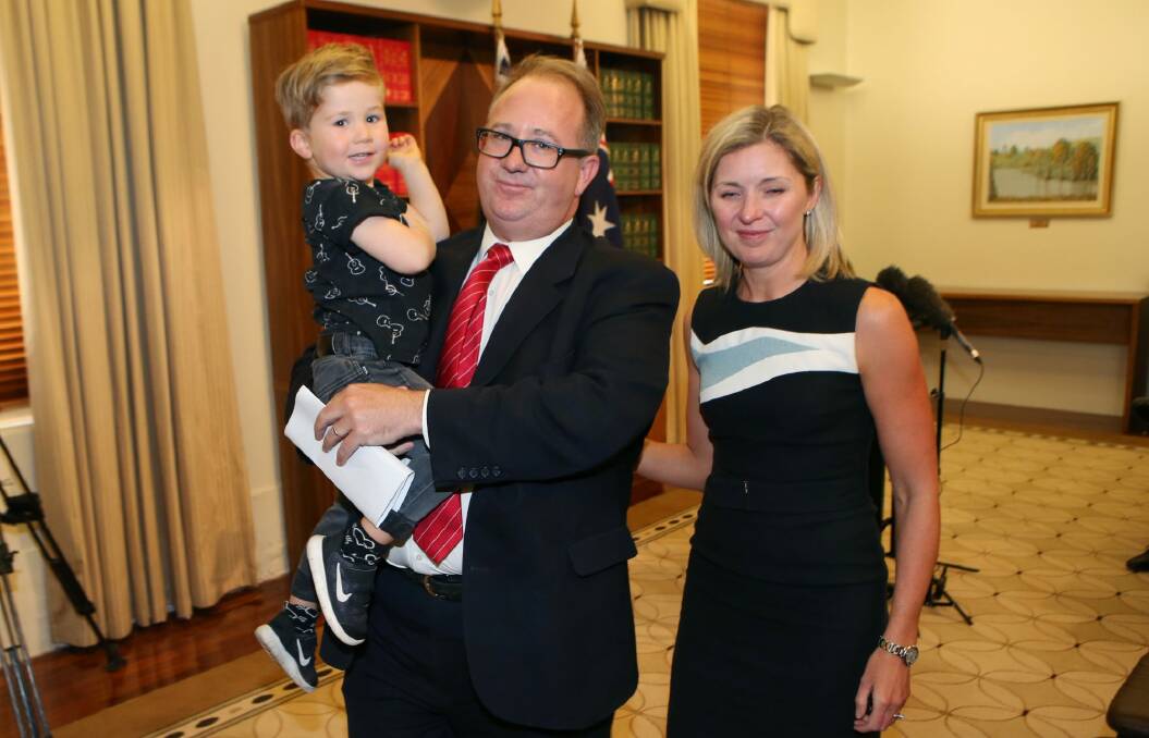 David Feeney with his wife Liberty Sanger and son Ned after resigning from federal Parliament. Photo: AAP