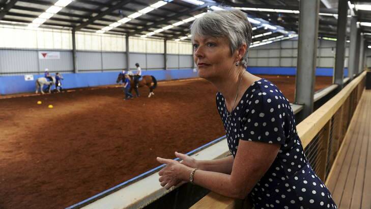 Margaret Morton, Executive Director of Pegasus, watches a riding for the disabled class at the complex in Holt. Photo: Graham Tidy