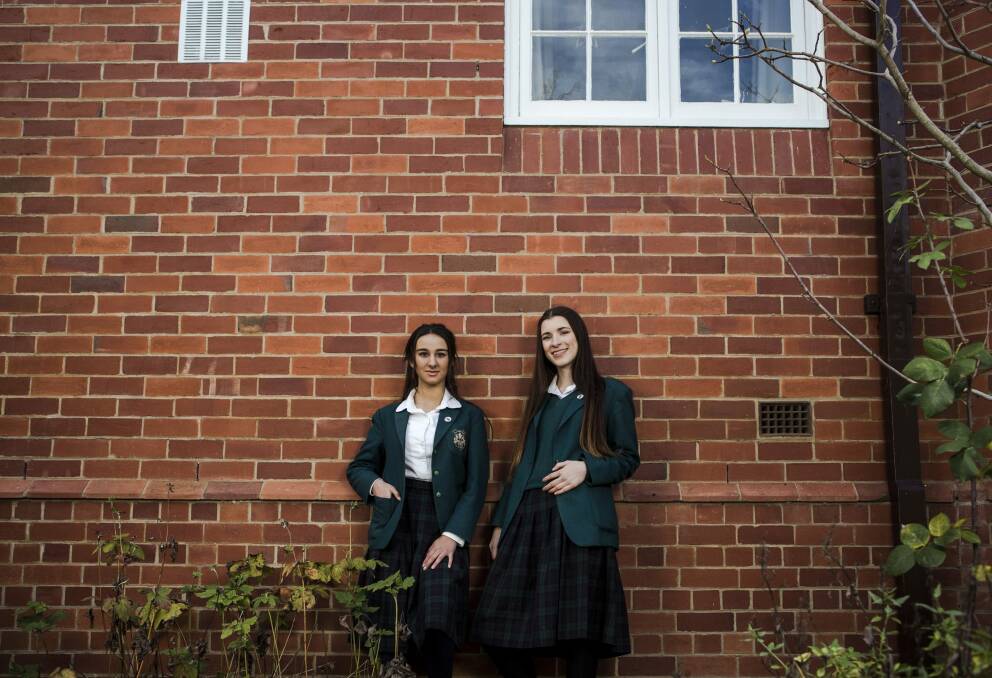 Year 10 students Maria Tsiokantas 15, and Chelsea Bonanno 16, have made it through to the live auditions round on X Factor Australia. Photo: Jamila Toderas
