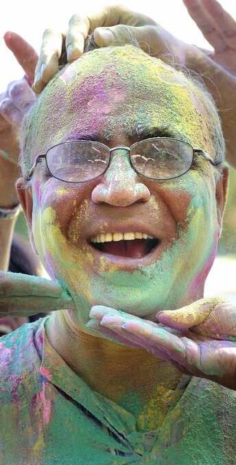 Raj Satija gets into the spirit of the Holi Festival of Colours event planned for Stage 88 on Saturday. Photo: Jeffrey Chan
