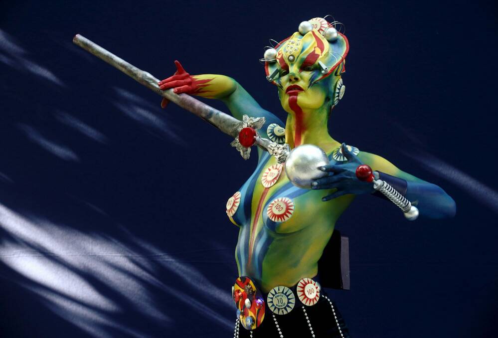 A model poses during the annual World Bodypainting Festival in Poertschach, Austria, July 3, 2015. The event takes place from July 3 to 5 at Lake Woerthersee in Austria's southern Carinthia province.  Photo: Reuters