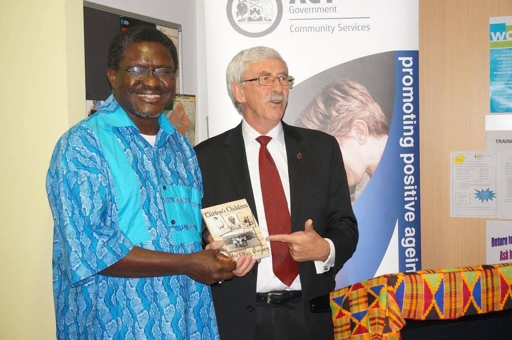 Kabu Okai-Davies, left and former MLA John Hargreaves at the launch of Curfew's Children. Photo: Supplied