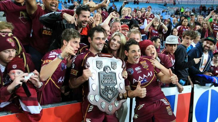 QLD players Cameron Smith, left, and Billy Slater, celebrating with fans at the State of Origin. Photo: Jonathan Carroll