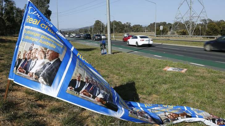 A Liberal Party election banner that had fallen over along Gungahlin Drive in Mitchell. Photo: Jeffrey Chan