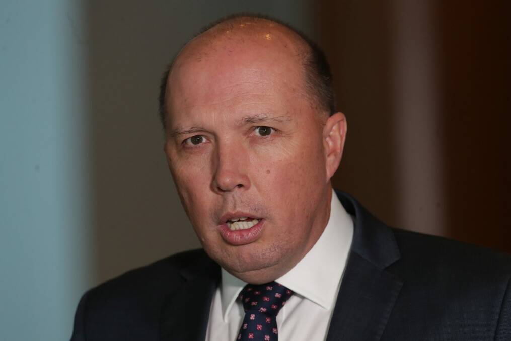 Peter Dutton announced the Home Affairs department's contract with Datacom on Wednesday. Photo: Andrew Meares