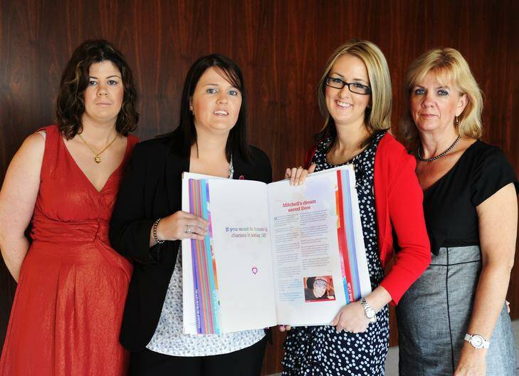 Hayley Brennan, Chloe Brennan, Melanie Plant, and Sonja Brennan, with the updated Book of Life, open at the page of their story, at the Launch of Donate Life Week. Photo: Rohan Thomson
