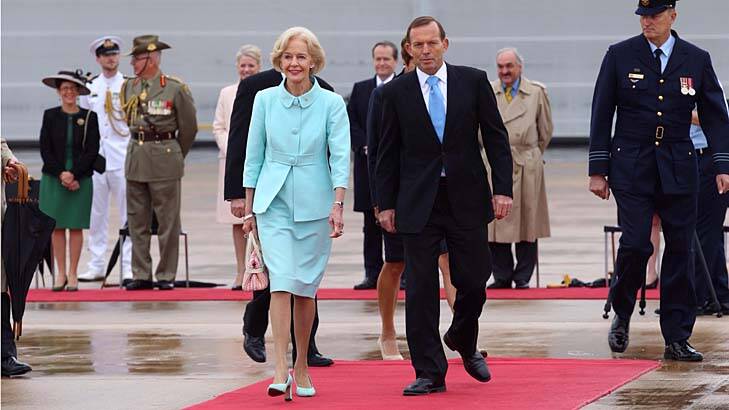 Outgoing Governor-General Dame Quentin Bryce, pictured with the Prime Minister as she departured Canberra on Wednesday, has been made a dame as part of Tony Abbott's reintroduction of imperial honours. Photo: Andrew Meares