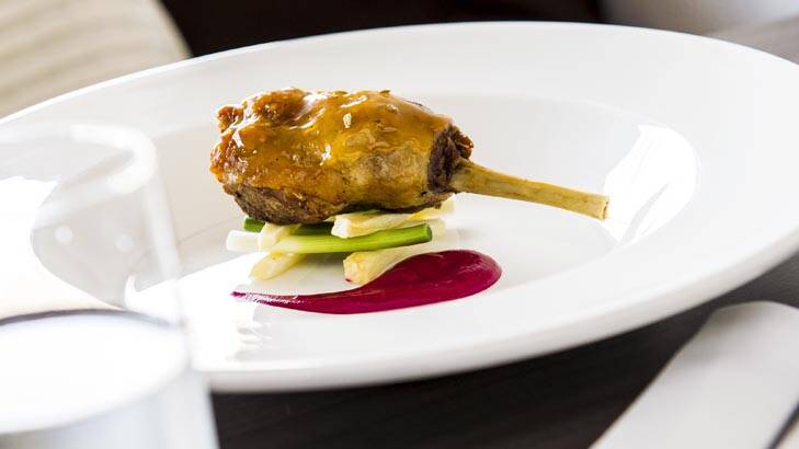 Orange and fennel-glazed confit duck maryland with pencil leek, parsnip and beetroot. Photo: Rohan Thomson