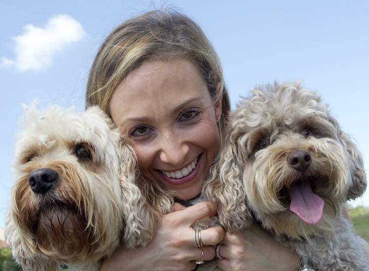 Bondi Vet Lisa Chimes with her dogs Lucan and Nelson at Dudley Page Reserve. Photo: Lee Besford