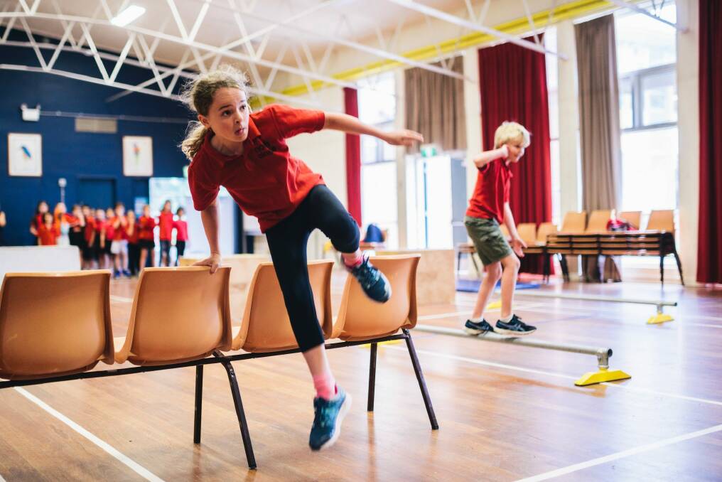 What chairs? North Ainslie pupil Josie Holt, 10, keeps running. Photo: Rohan Thomson