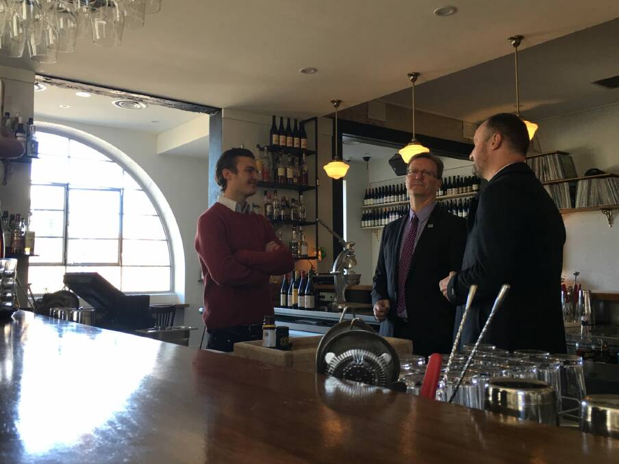Chief Minister Andrew Barr with Attorney-General Gordon Ramsay and, left, Bar Rochford owner Nick Smith.  Photo: Kirsten Lawson