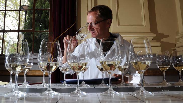 Up early... international wine judge from Germany, Steffen Schindler, samples some entries. Photo: Graham Tidy