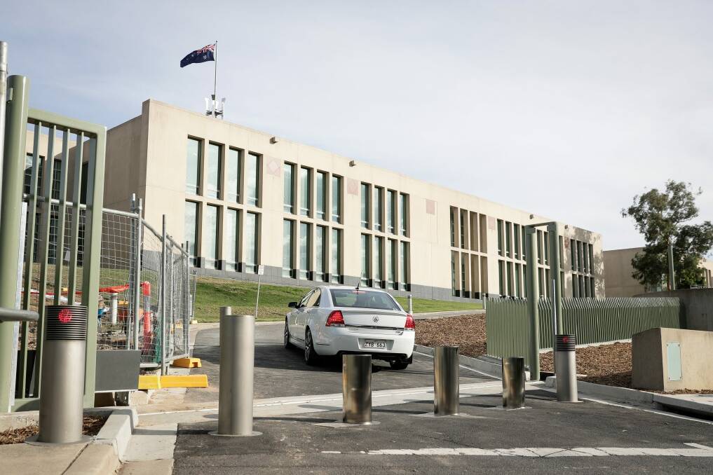 Retractable bollards, such as those at Parliament House, are one example of the type of physical security asset needing review at some ACT government properties. Photo: Alex Ellinghausen