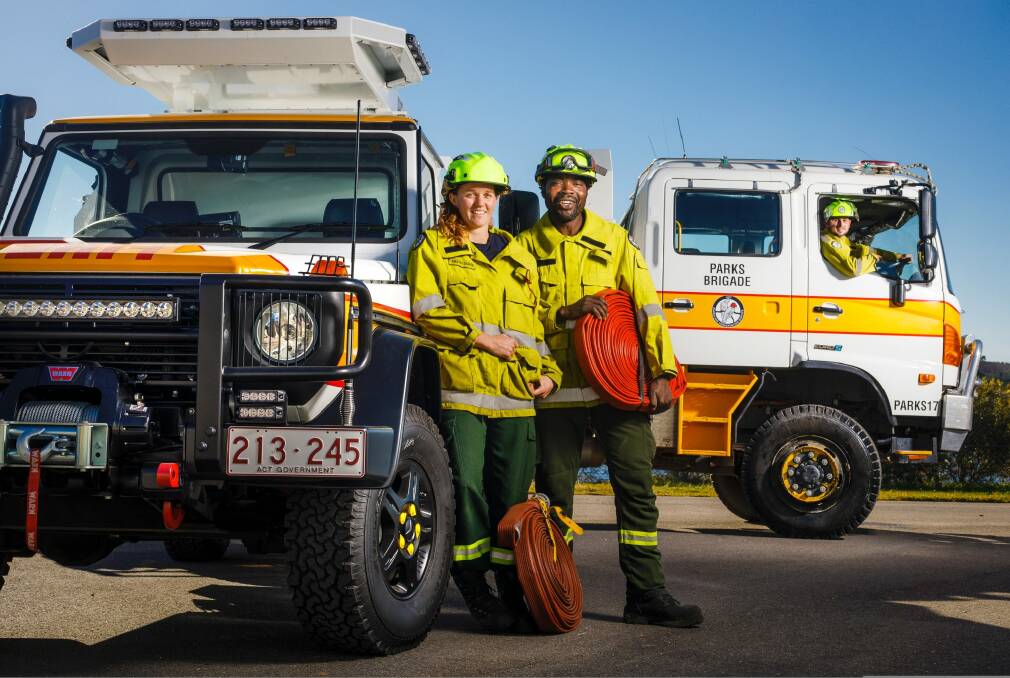 ACT Parks and Conservation Service fire management field officers Kirsten Tasker, Rocky Simachila and James Thornburn. Photo: Sitthixay Ditthavong