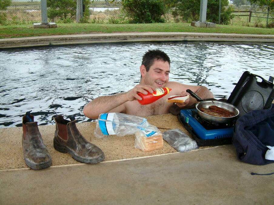 Enjoying a barbecue lunch while in the hot springs in the Pilliga Pool in northern NSW. Photo: Tim the Yowie Man